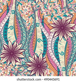 Tracery seamless calming pattern. Mehndi design. Ethnic colorful doodle texture. Curved doodling background. Vector.