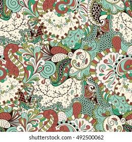 Tracery seamless calming pattern. Mehndi design. Ethnic colorful doodle texture. Curved doodling background. Vector.