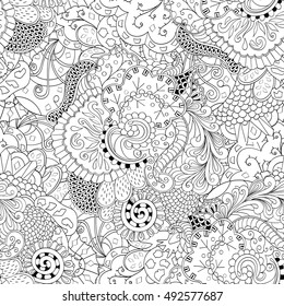 Tracery seamless calming pattern. Mehndi design. Ethnic monochrome binary doodle texture. Curved doodling black and white background. Vector.