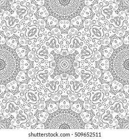 Tracery seamless calming pattern. Mehndi design. Ethnic monochrome binary doodle texture. Curved doodling black and white background. Vector.