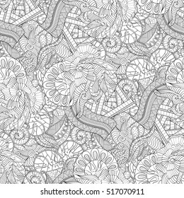 Tracery seamless calming pattern. Mehndi design. Ethnic monochrome binary doodle texture. Curved doodling black and white background. Vector.