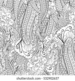 Tracery seamless calming pattern. Mehndi design. Ethnic monochrome binary doodle texture. Curved doodling black and white background. Vector.