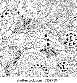 Tracery seamless calming pattern. Mehndi design. Ethnic monochrome binary doodle texture. Curved doodling black and white background. Vector.