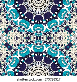 Tracery seamless calming pattern. Mehndi design. Ethnic colorful doodle texture. Curved doodling background. Vector.