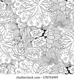 Tracery seamless calming pattern. Mehndi design. Ethnic monochrome binary doodle texture. Curved doodling black and white background. Vector.