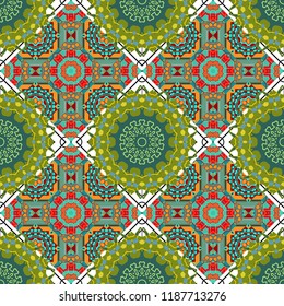 Tracery seamless pattern. Mehndi design in green, blue and orange colors. Ethnic colorful doodle texture. Curved doodling background. Vector illustration.
