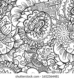 Tracery seamless pattern. Mehndi design. Ethnic monochrome binary doodle texture. Curved doodling black and white background. Vector