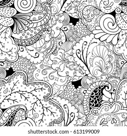 Tracery seamless pattern. Mehndi design. Ethnic monochrome binary doodle texture. Curved doodling black and white background. Vector