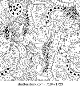 Tracery seamless pattern. Mehndi design. Ethnic monochrome binary doodle texture. Curved doodling black and white background. Vector