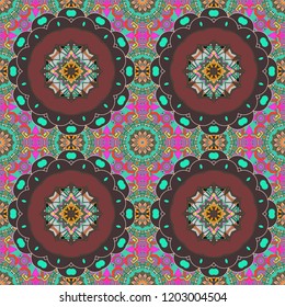 Tracery seamless pattern in Mehndi style. Ethnic colorful doodle texture in blue, brown and green colors. Vector illustration. Curved doodling background.