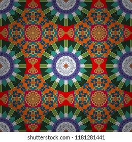 Tracery seamless pattern. Vector curved doodling background. Ethnic colorful doodle texture in blue, green and orange colors. Mehndi design.