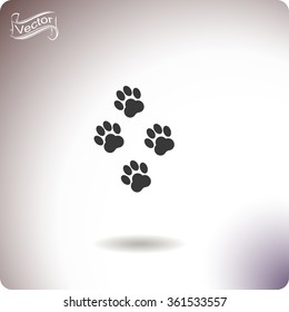 Traces of animal paws vector icon.