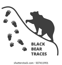 
traces of the black bear and the black bear silhouette vector illustration isolated on white background