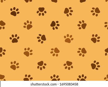 Traces of a cat. Footprints for wrappers and fabric. Seamless repeating vector pattern. Pet products design concept. Brown footprints on yellow background. Accidental disposition and direction of paws