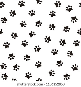 Traces of dog paws vector pattern