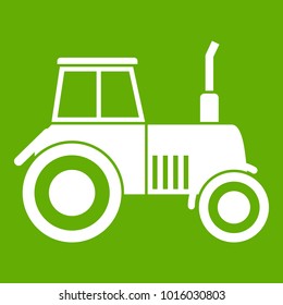 Tractor icon white isolated on green background. Vector illustration