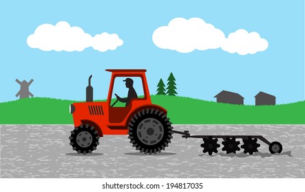 tractor processes the earth a rural landscape