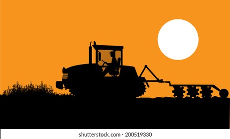 tractor processes the earth a rural landscape