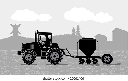 tractor processes the earth a rural landscape