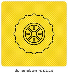 Tractor wheel icon. Tire service sign. Linear icon on orange background. Vector