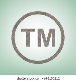 Trade mark sign. Vector. Brown flax icon on green background with light spot at the center.