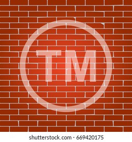 Trade mark sign. Vector. Whitish icon on brick wall as background.
