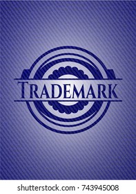 Trademark emblem with jean background