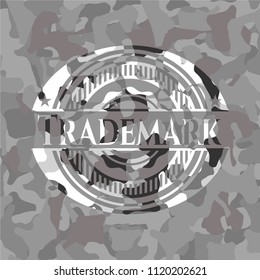 Trademark on grey camouflaged pattern