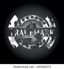 Trademark on grey camouflaged pattern