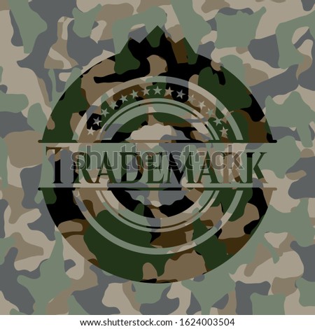 Trademark written on a camo texture. Vector Illustration. Detailed.