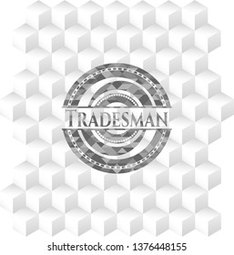 Tradesman grey badge with geometric cube white background