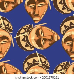 Traditional African culture attributes. Vintage ritual wooden masks. Vector repeated seamless pattern