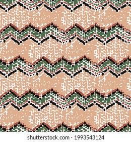Traditional African ornament of zigzag elements. Vector repeated seamless pattern.