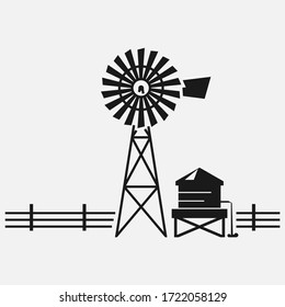 Traditional American water well windmill black and white vector icon.