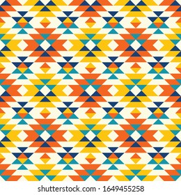 Traditional aztec navajo seamless pattern in blue, teal, yellow, orange.