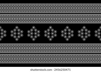 Traditional black ethnic motifs ikat geometric fabric pattern cross stitch.Ikat embroidery Ethnic oriental Pixel black background.Abstract,vector,illustration. Texture,decoration,wallpaper.