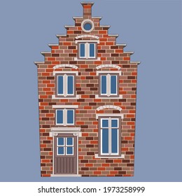 Traditional brick medieval house in the historical part of Bruges.
