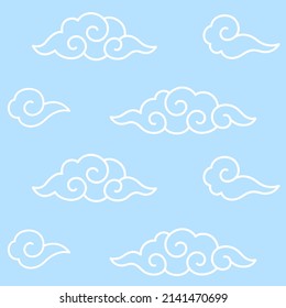 Traditional Chinese or Japanese clouds with spiral swirls. Seamless pattern, simple blue background. Vector illustration.