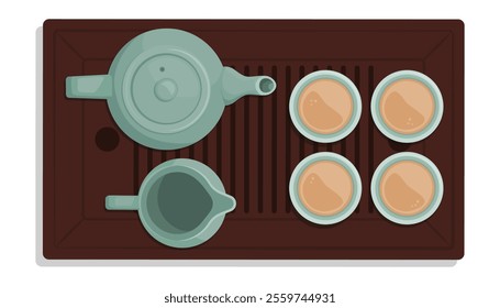 Traditional Chinese tea set with teapot, jug and cups full of tea, top view