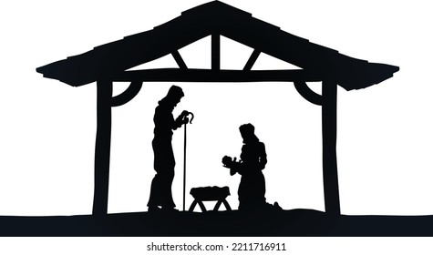 Traditional Christian Christmas Nativity Scene of baby Jesus in the manger with Mary and Joseph in silhouette 