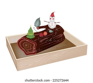 A Traditional Christmas Cake, Yule Log Cake or Bu che de Noel in Wooden Box for Christmas Celebration. 