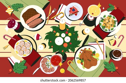 Traditional Christmas dishes in flat style. Xmas table top view with meals in plates, drink and decorated cutlery. Red tablecloth with holiday food, candles and spruce wreath of fir branches.