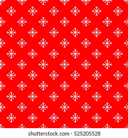 Traditional Christmas' and New Year's background. Seamless pattern with white snowflakes on red background. Holidays concept. Good for wrapping paper, scrapbooking, websites' background.