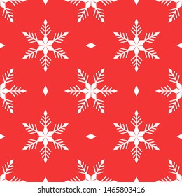 Traditional Christmas seamless pattern of white snowflakes on red background.