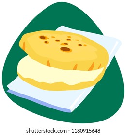 Traditional Colombian Arepa without filler on napkin and green background
