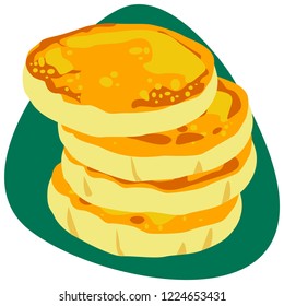 Traditional Colombian toasted Arepas without filler in a pile on green background