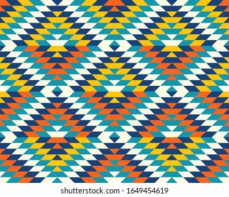 Traditional colorful bohemian diamonds in orange, teal, blue, and yellow seamless pattern.