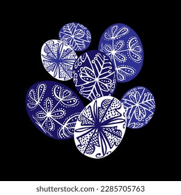 Traditional Easter eggs in blue and white colors on a black background