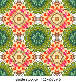 Traditional ethnic background in green, beige and pink colors. Vector colorful kaleidoscopic seamless pattern for textile, ceramic tiles, wallpapers and fabric.