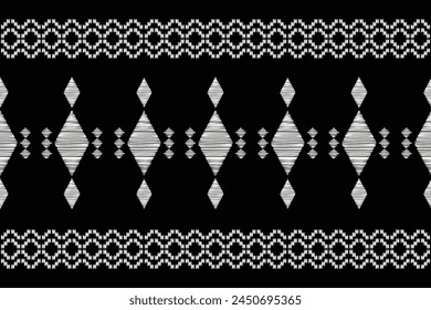 Traditional Ethnic ikat motif fabric background pattern geometric .African Ikat embroidery Ethnic oriental pattern black background wallpaper. Abstract,vector,illustration.Texture,frame,decoration.